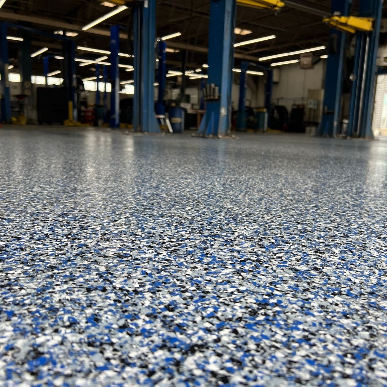 Auto shop showroom floor coating Springfield MO — Ozarks Concrete Coatings