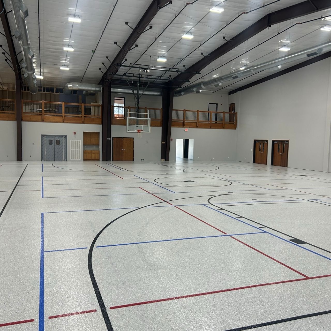 Church gymnasium floor coating with basketball court lines Springfield MO