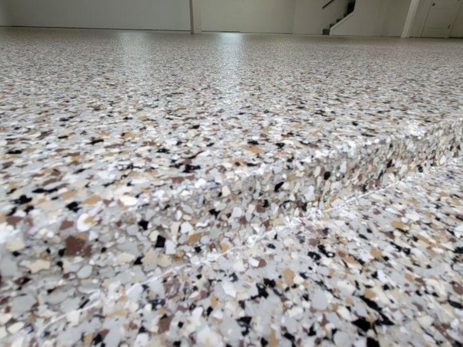 Full flake epoxy garage floor Nixa Missouri — polyaspartic coating Ozarks Concrete Coatings
