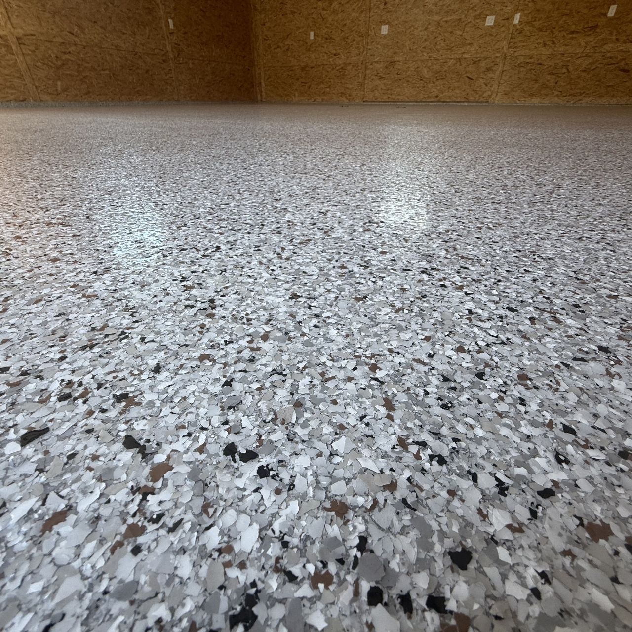 New construction garage floor coating Springfield MO — Ozarks Concrete Coatings